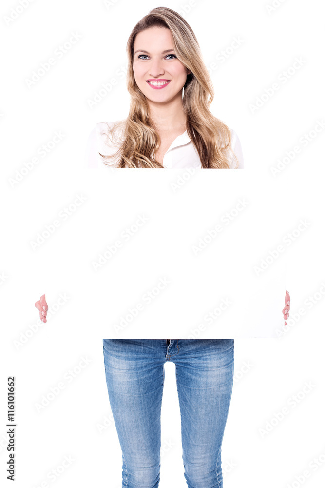 Beautiful young woman holding placard. Beautiful young woman holding placard.