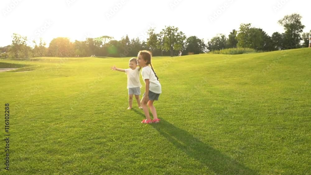 bursting soap bubbles kids. Happy active games. Two children boy and girl playing together. Slow motion video footage. bursting soap bubbles kids. Happy active games. Two children boy and girl playing together. Slow motion video footage.