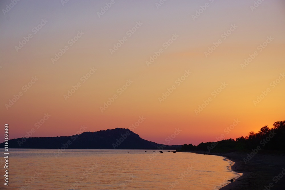 Sunset over the Bay of Navarino in Gialova in Messenia, Greece
