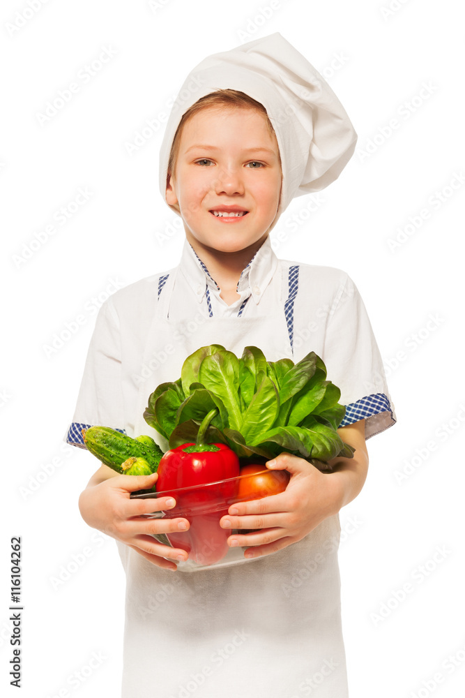 Young smiling cook with bowl of fresh vegetables Young smiling cook with bowl of fresh vegetables