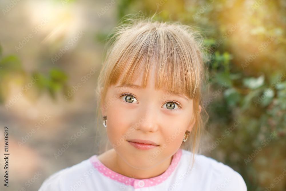Portrait of a girl on the nature Portrait of a girl on the nature
