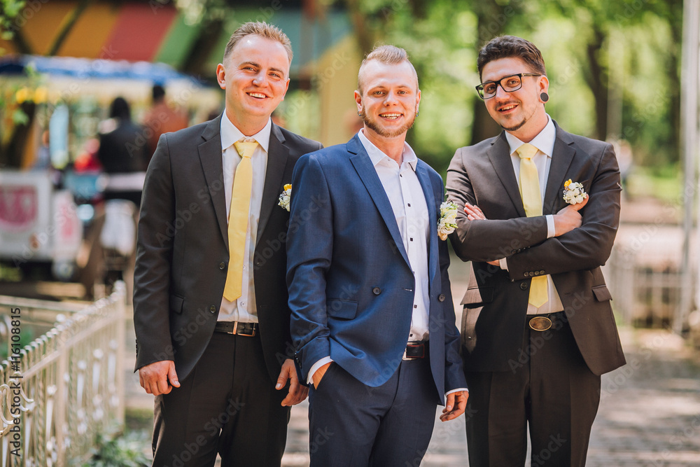 Three friends, groom with groomsman having fun Three friends, groom with groomsman having fun