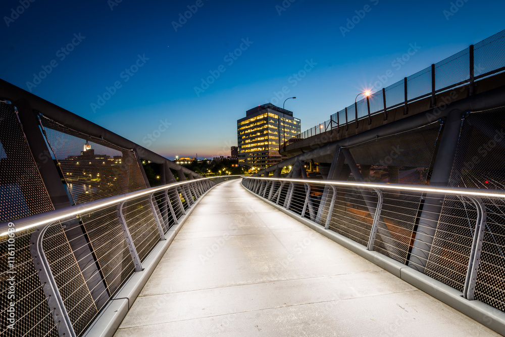 The North Bank Pedestrian Bridge at night, in Cambridge, Massac The North Bank Pedestrian Bridge at night, in Cambridge, Massac