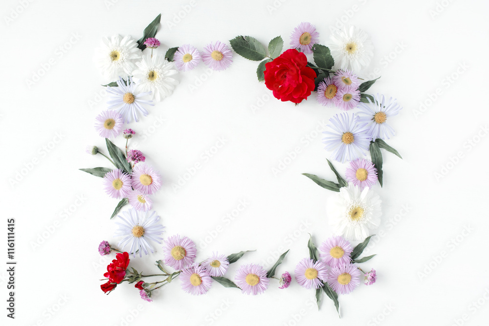 Fototapeta round frame wreath pattern with roses, pink flower buds, branches and leaves isolated on white background. flat lay, top view