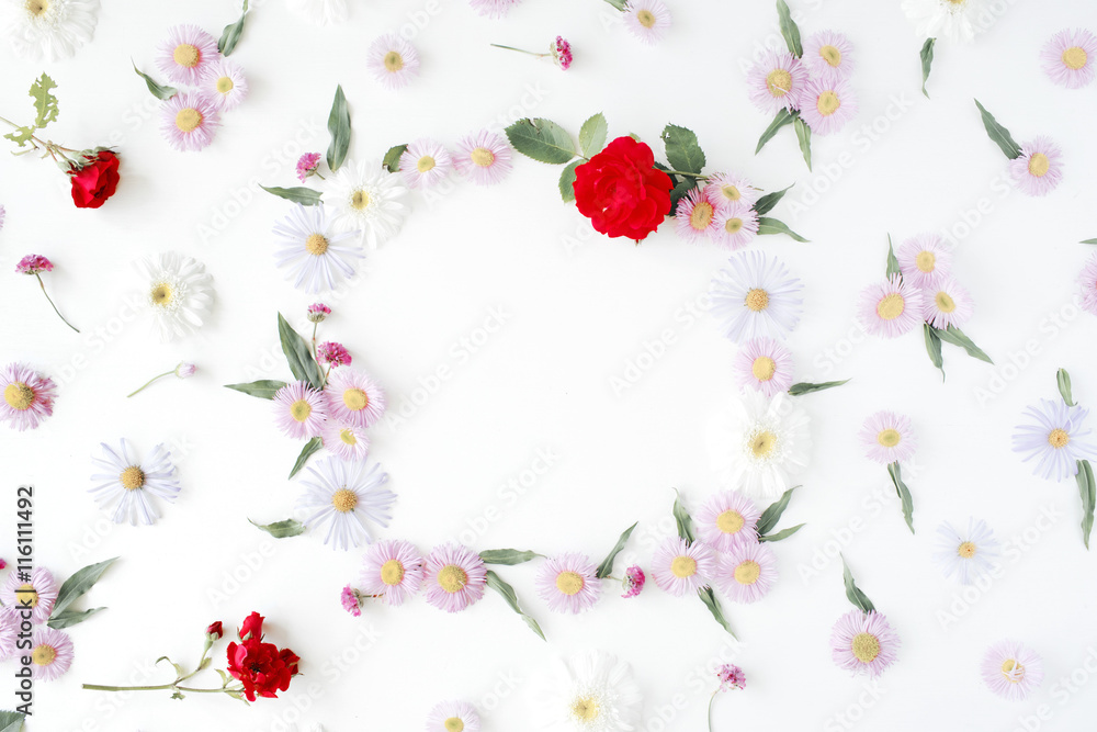 round frame wreath pattern with roses, pink flower buds, branches and leaves isolated on white background. flat lay, top view round frame wreath pattern with roses, pink flower buds, branches and leaves isolated on white background. flat lay, top view