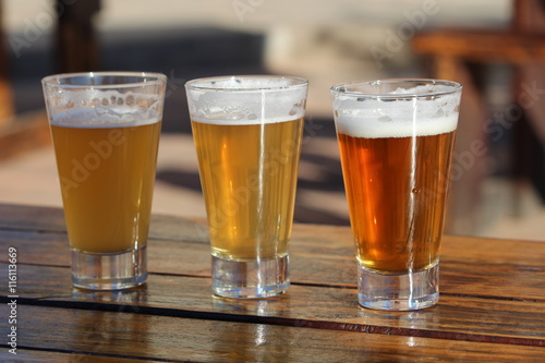 A selection of three craft beers during a tasting session