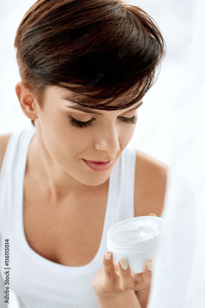 Skin Care. Beautiful Happy Woman Holding Face Cream, Lotion Skin Care. Beautiful Happy Woman Holding Face Cream, Lotion