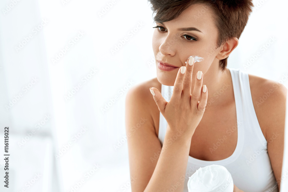 Beauty Skin Care. Beautiful Woman Applying Cosmetic Face Cream Beauty Skin Care. Beautiful Woman Applying Cosmetic Face Cream