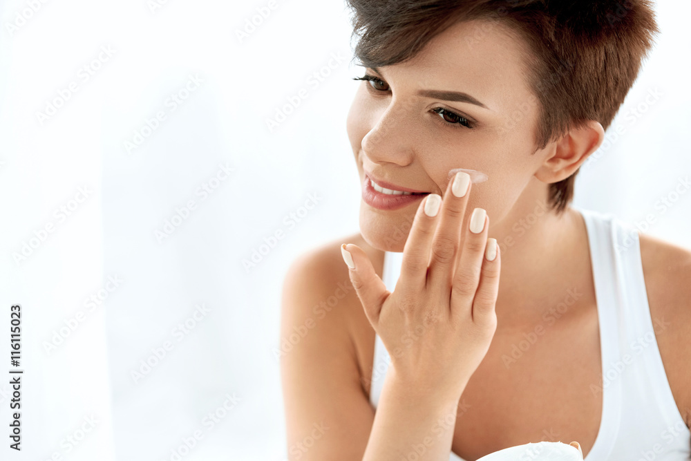 Beauty Skin Care. Beautiful Woman Applying Cosmetic Face Cream Beauty Skin Care. Beautiful Woman Applying Cosmetic Face Cream