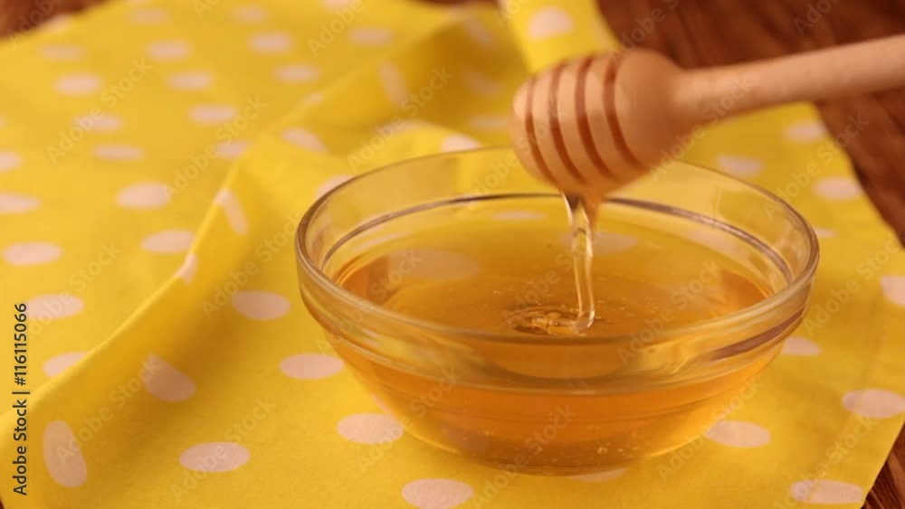 Extraction honey with a dipper, Honey is a source of health, Extraction honey with a dipper, Honey is a source of health,