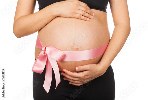 Wallpaper Mural Pregnant woman with pink ribbon around her belly Torontodigital.ca