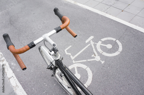 Vintage road bike stop on bike lane
