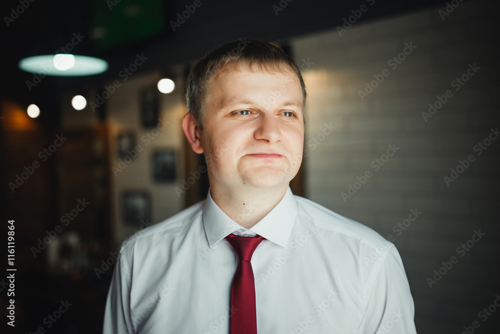 Man corrects belt, fees groom, man's hands, dressing, man buttons pants, jeans Man corrects belt, fees groom, man's hands, dressing, man buttons pants, jeans