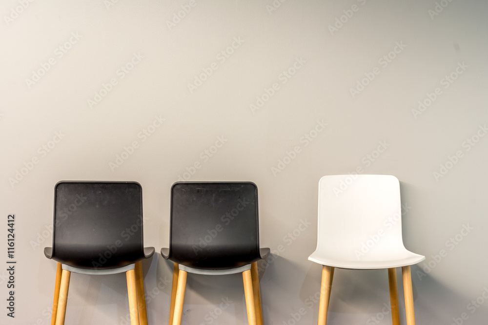 Obraz premium Modern chairs by the wall