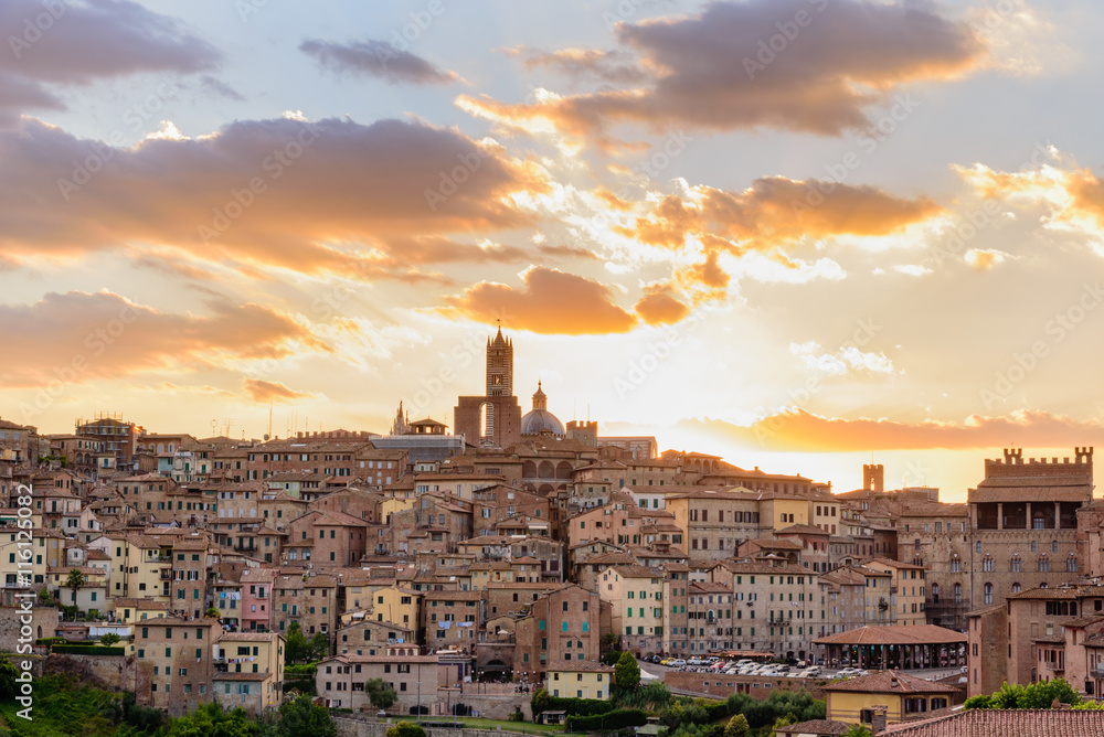 View of the city of Siena at sunset