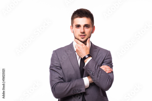 Portrait of a pensive businessman touching his chin over white background © F8  \ Suport Ukraine