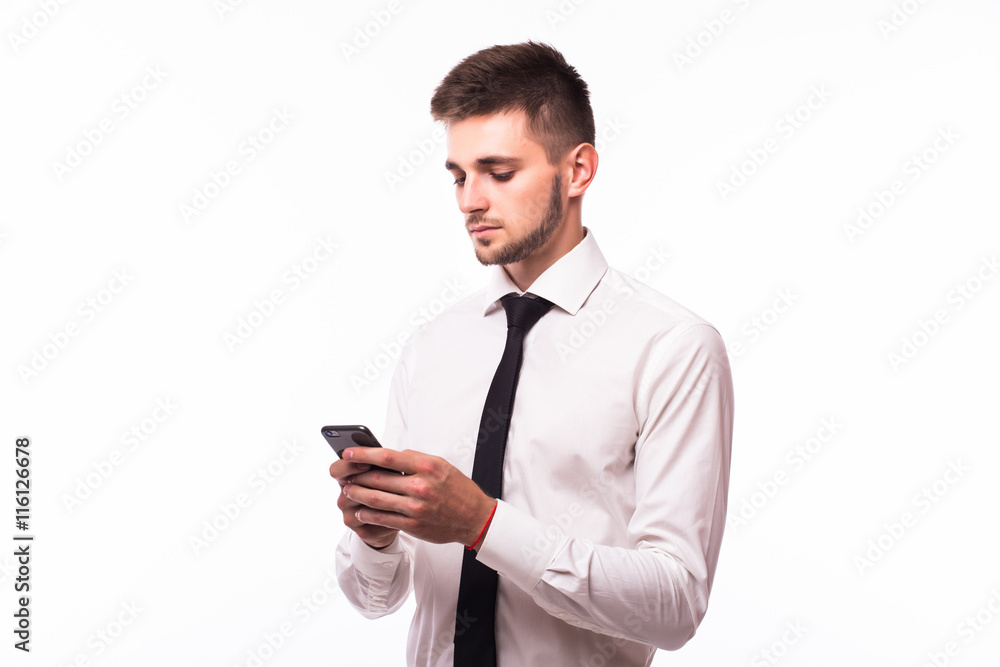 Happy businessman holding smartphone and texting on white Happy businessman holding smartphone and texting on white