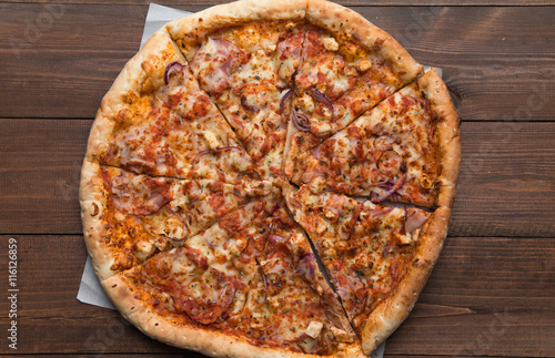 pizza on a wooden background