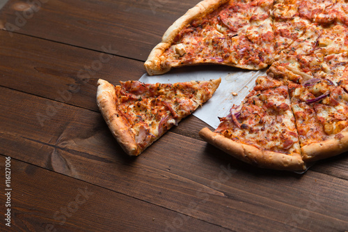 pizza on a wooden background