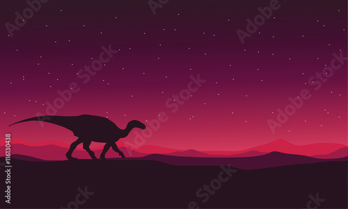 Landscape Iguanodon silhouettes vector