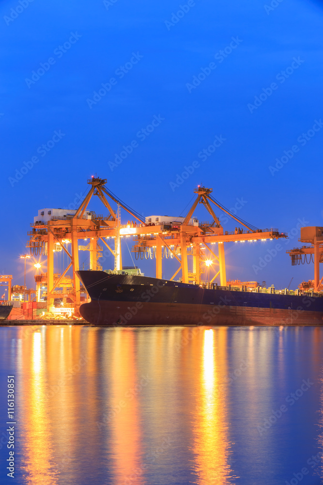 Shipyard port terminal evening twilight. Import or Export cargo concept background.