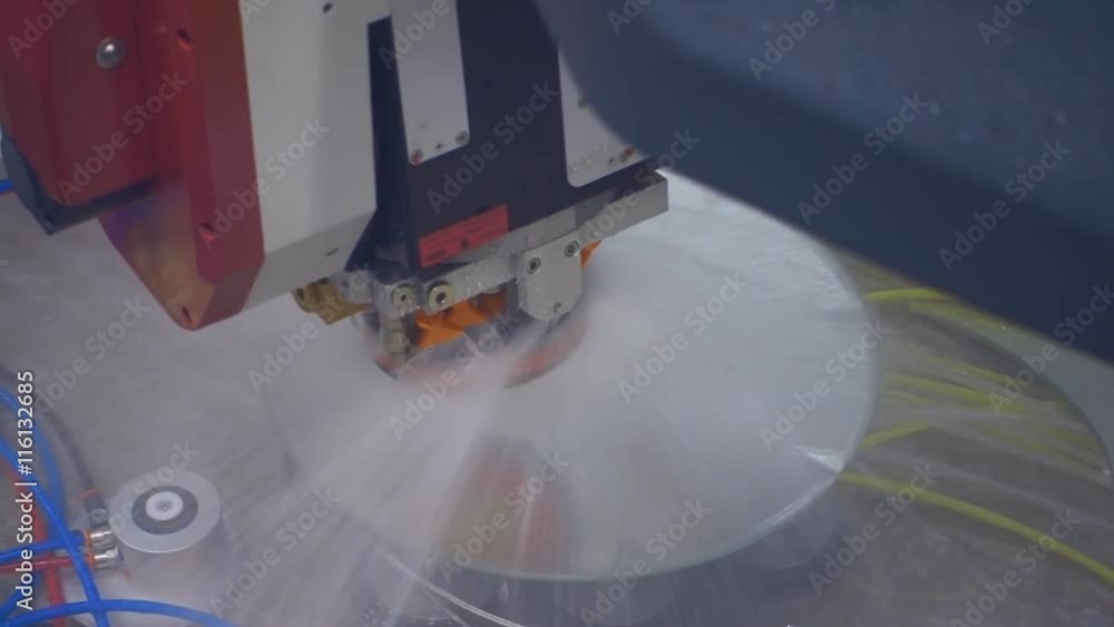 Industrial machine grinds the edge of the mirror and cooling detail of an aqueous emulsion. Slow motion, high speed camera, 250fps Industrial machine grinds the edge of the mirror and cooling detail of an aqueous emulsion. Slow motion, high speed camera, 250fps