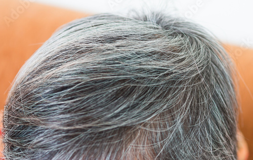 blurred of going gray in young woman shows her gray hair, hair g