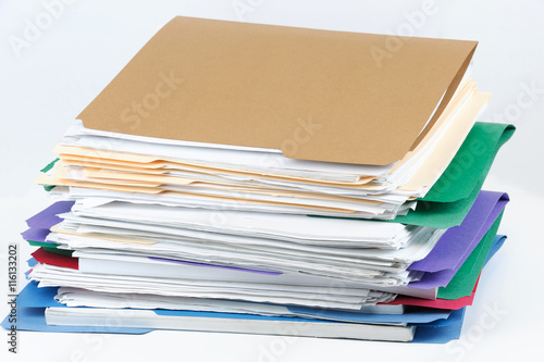 stacking documents and folders on white background