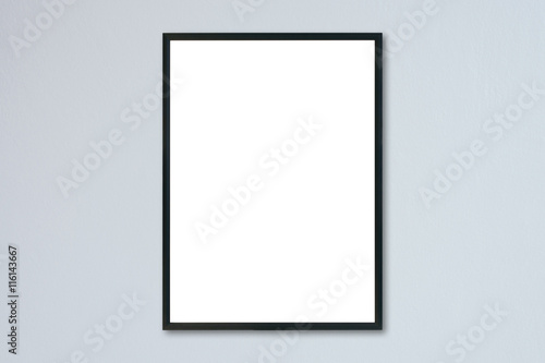 Mock up blank frame hanging on wall in room