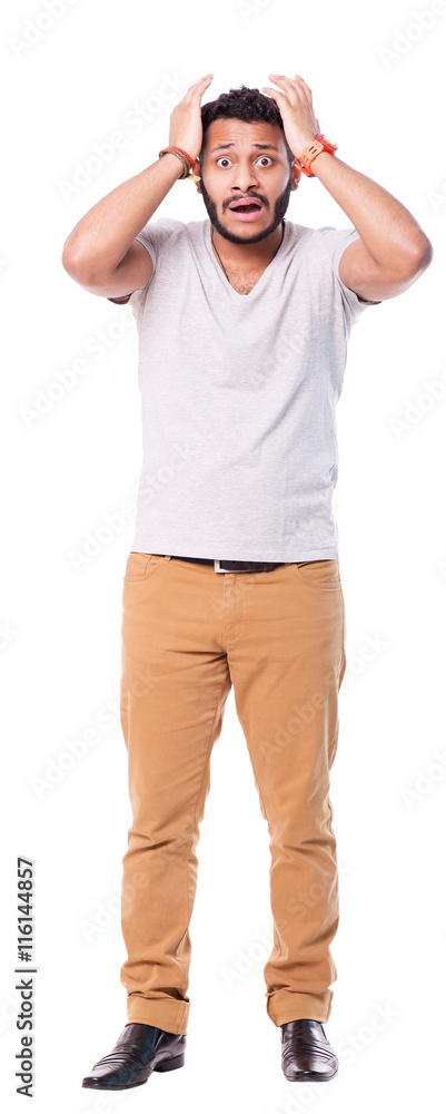 Perplexed latino man with beard throwing hands up. Looks troubled and discouraged. Full length portrait isolated on white background.