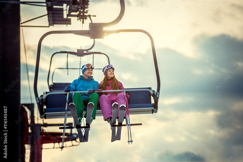 Skiers on a lift Skiers on a lift