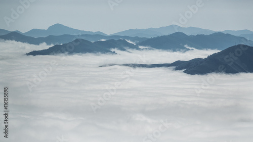 Over the clouds and fog among mountain summits landscape © F.C.G.