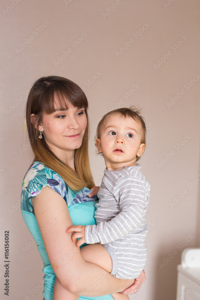 Portrait of happy mother and baby at home Portrait of happy mother and baby at home