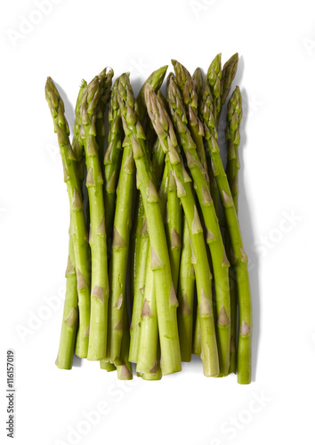 A bunch of asparagus tips isolated on a white background