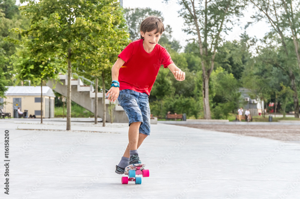 outdoor portrait of young smiling teenager boy riding short mode outdoor portrait of young smiling teenager boy riding short mode