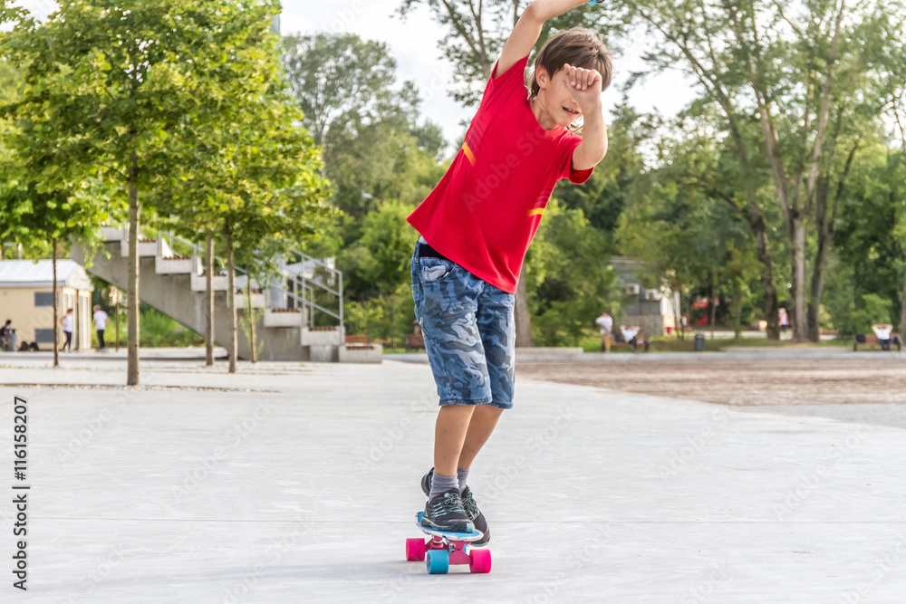 outdoor portrait of young smiling teenager boy riding short mode outdoor portrait of young smiling teenager boy riding short mode