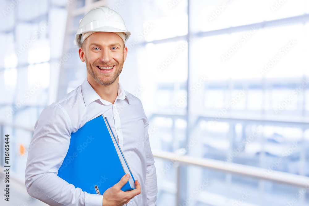 Happy young businessman architect smiling Happy young businessman architect smiling