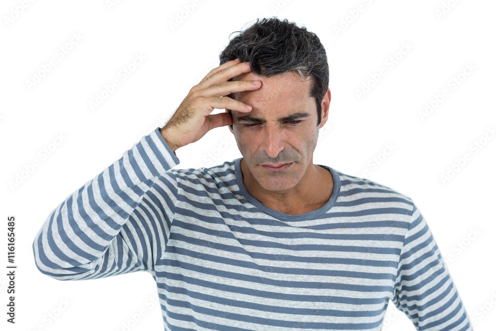Stressed mid adult man against white background Stressed mid adult man against white background
