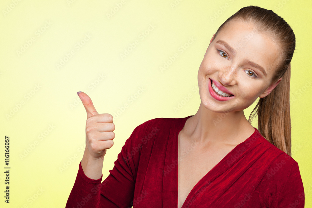 Happy young woman with thumbs up Happy young woman with thumbs up