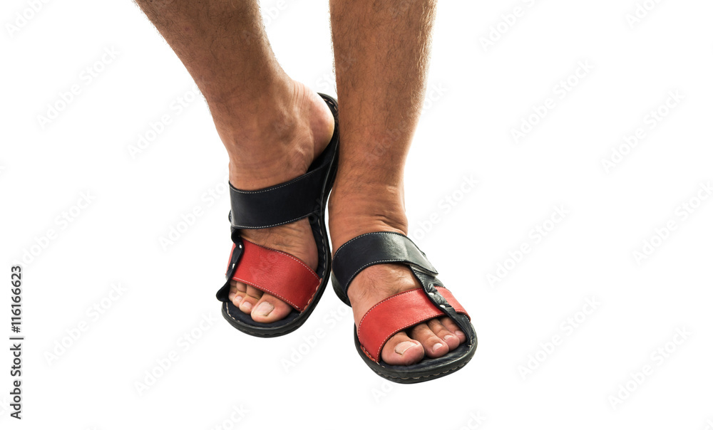 Men's feet in leather sandals