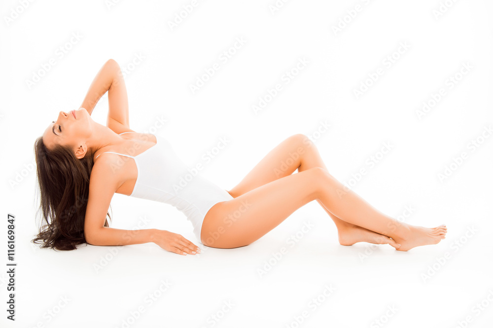 Sensual sexy slim woman showing her body in underwear