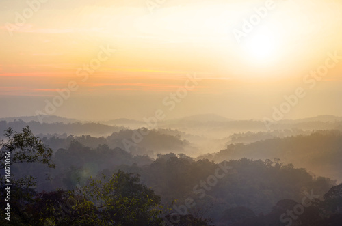 Mountain landscape background with sunrise.