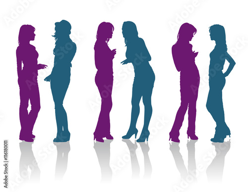 Silhouettes of girlfriends talking to each other