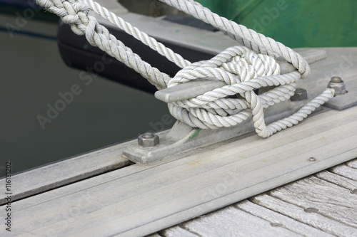 Boating knot with a white mooring rope.