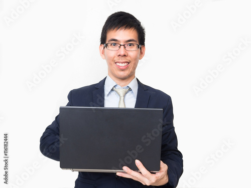 Asian business man wear glasses on professional suit with a lapt