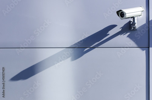 Surveillance camera on iron wall