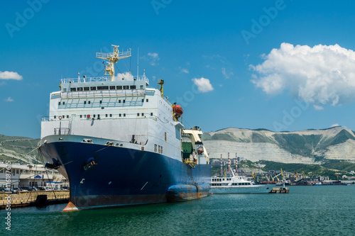 Cargo ship moored to the pier in the port of Novorossiysk, Russia.