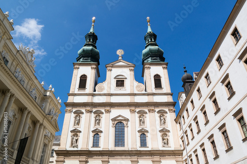 Top facade of Jesuit Church or University Church on Ignaz Seipel Platz in Vienna, Austria © TasfotoNL