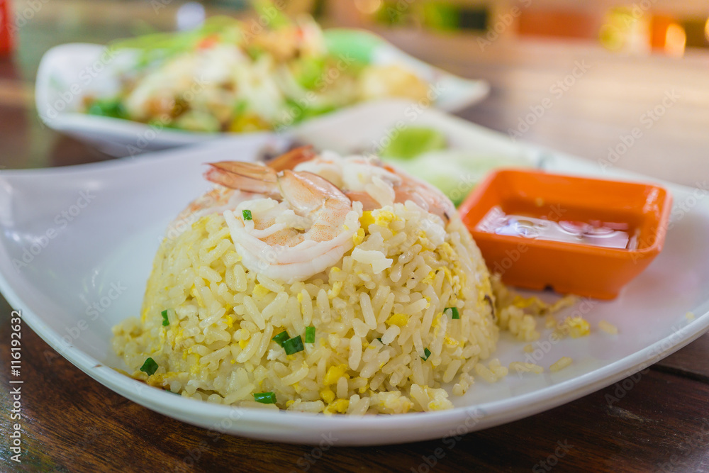 fried rice with shrimp white plates on the table fried rice with shrimp white plates on the table