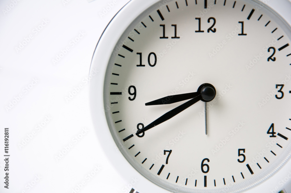 White alarm clock isolated on white background White alarm clock isolated on white background